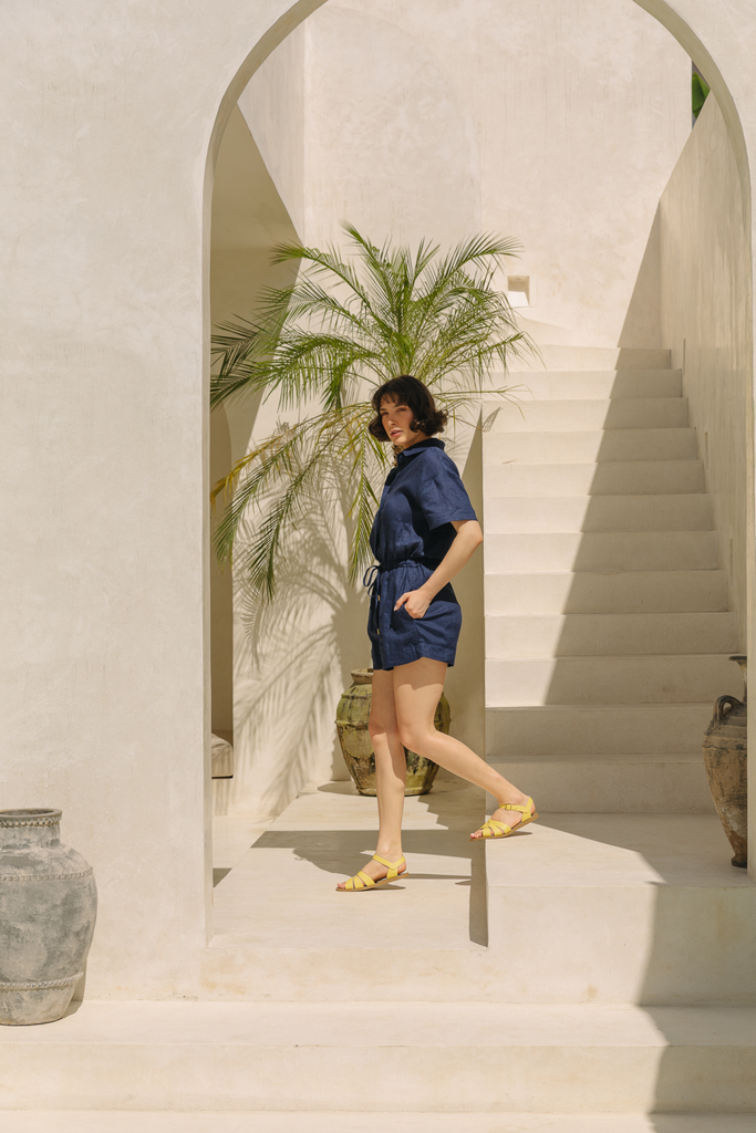 Navy linen playsuit with a relaxed fit by Summery The Label, designed for all-day comfort in warm climates